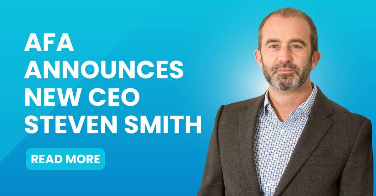 A man in a checked shirt and blazer stands next to text that reads, “AFA announces new CEO Steven Smith.” A “Read More” button is below the text. The background is blue.